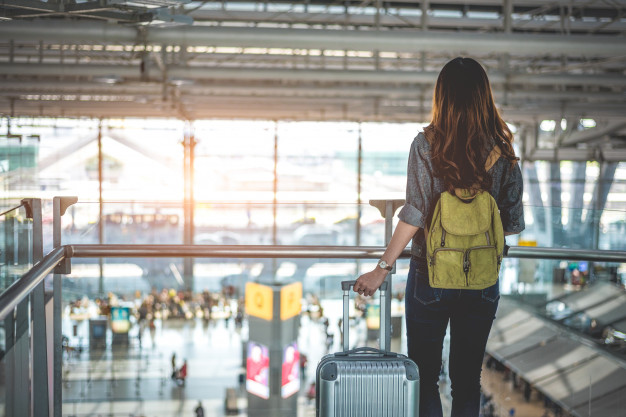 beauty-female-tourists-waiting-flight-take-off-airport-people-lifestyles_10307-840