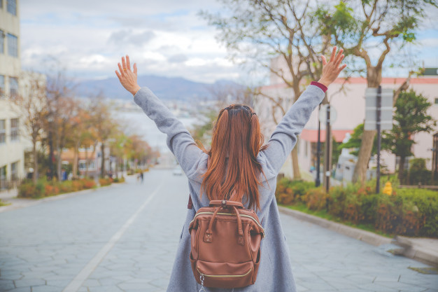 one-famous-place-hakodate-hokkaido-japan-girl-hands-up-looking-far-away_66269-367