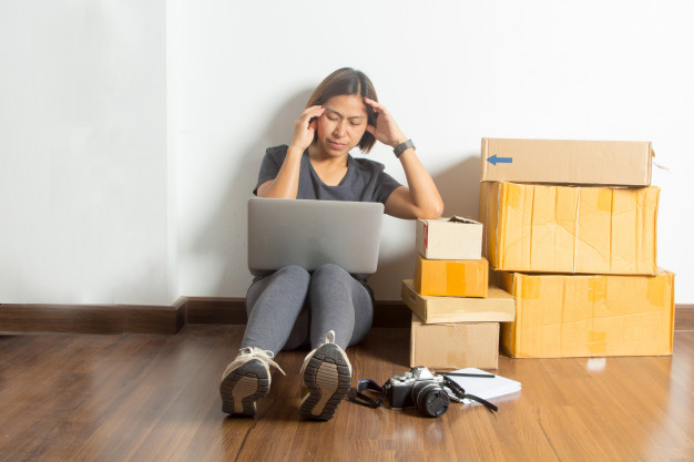 stressed-women-sitting-working-laptop-computer-from-room-home_45996-1204