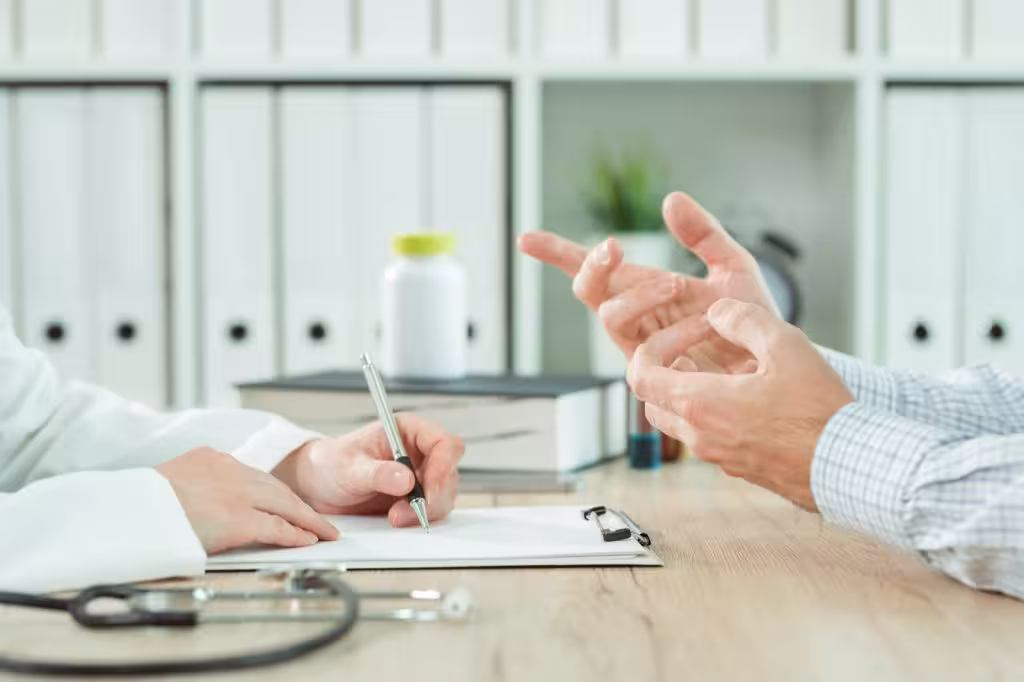 Doctor and patient during consultation in medical office