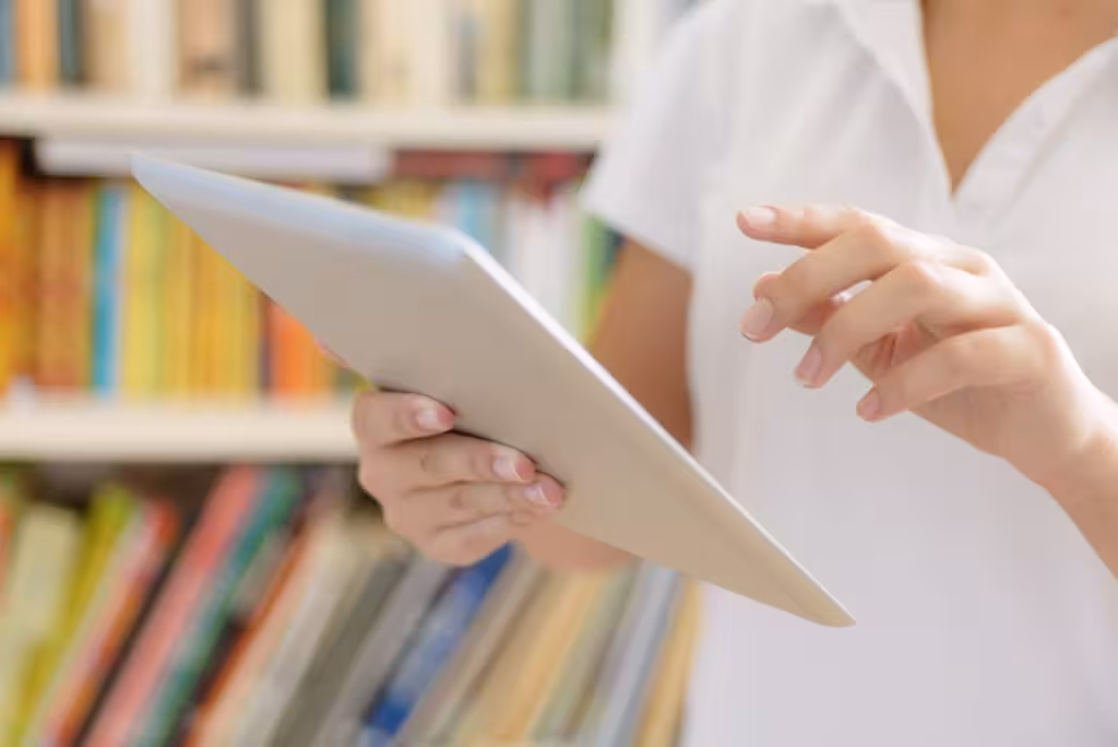 Female hands, making use of tablet computer
